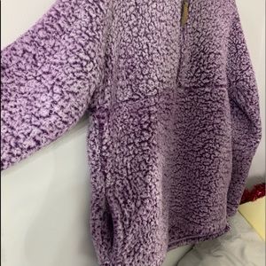 A size small (4-6) fuzzy crew neck!